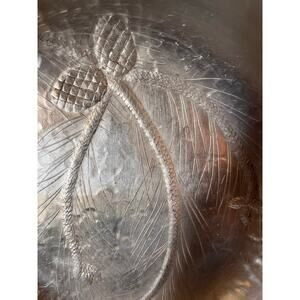 Hand-hammered stainless steel bowl by Lri Borrowdale , Wendell August Forge